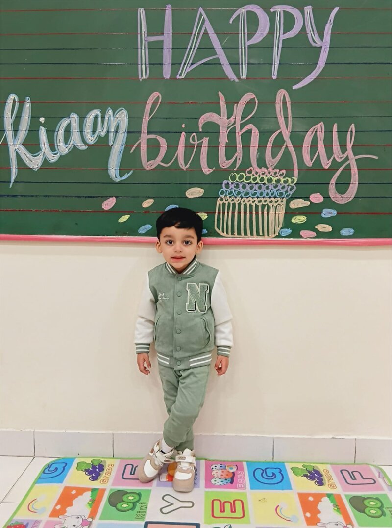 Kiaan's birthday photo, personalized with his name — the printed coloring-book page